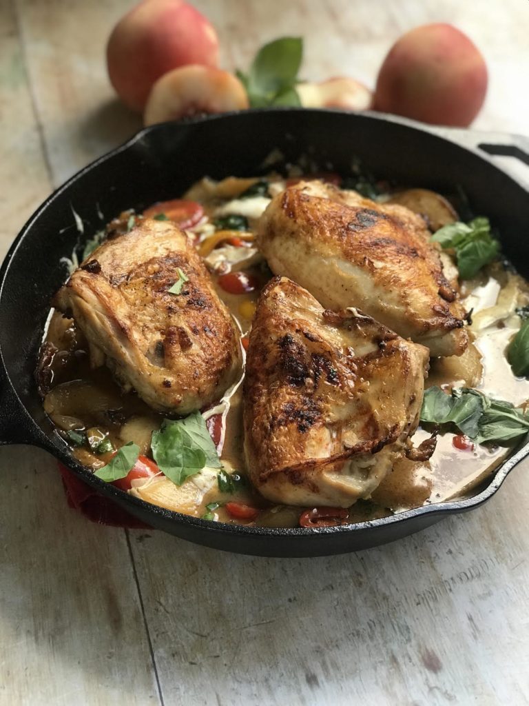 sauce in the skillet Skillet Roasted Chicken with Peaches and Mozzarella