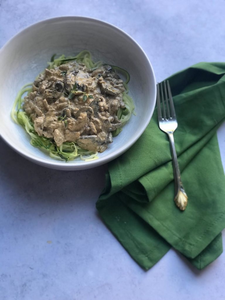 bowl of creamy ground stroganoff with green napkin