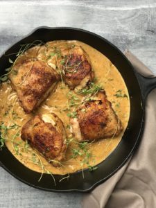 close up skillet with chicken